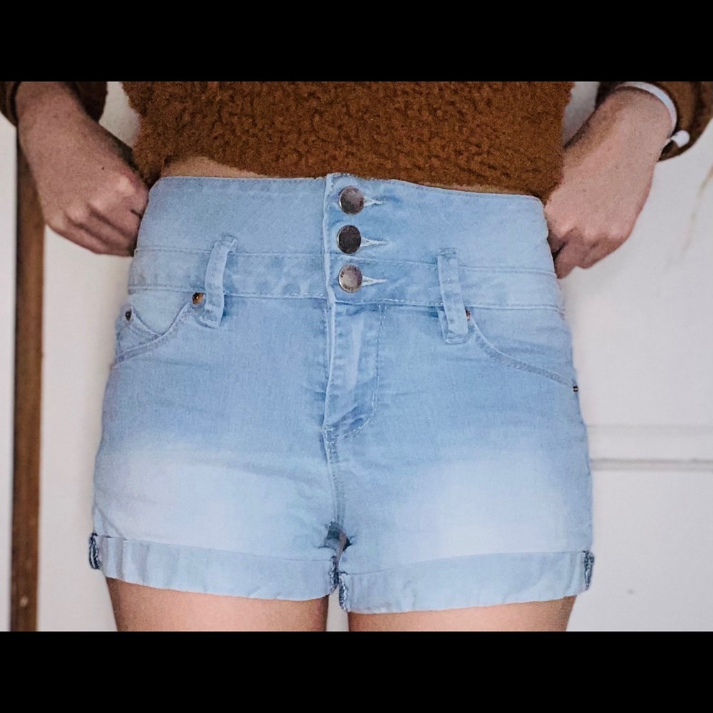 High-waisted light washed jean shorts.